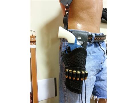 Belt mount Western holster with 6 rounds on wrap around strap