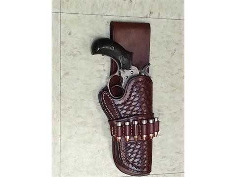 Hand tooled drop loop holster with 6 round bullet strap
